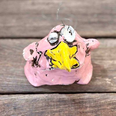 Rosa pipp med hår, 8x10 cm skulptur
