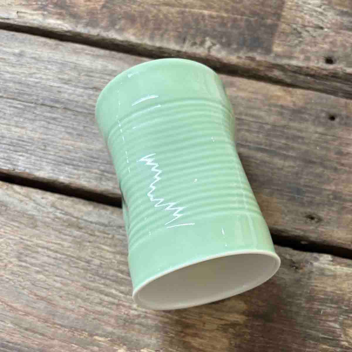 Coffee helps, krus porselen 10 cm (mint)