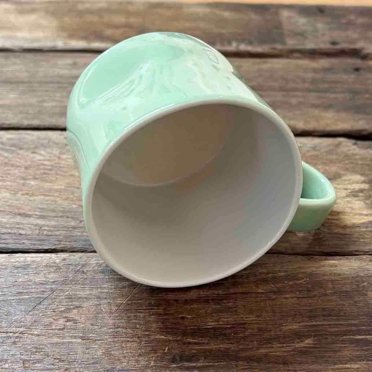 Half human, kopp porselen 7 cm (mint)